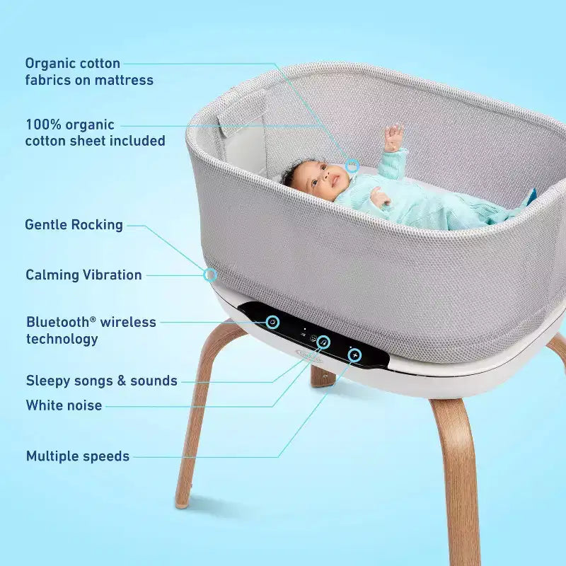 Berceau apaisant pour bébé – Doté d'une capote et d'une base à bascule ; pliable pour un transport et un rangement faciles.
