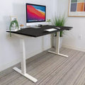 Bureau électrique assis-debout à double moteur avec plateau de 140 cm, noir et blanc